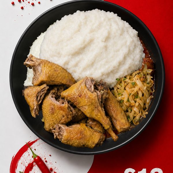 Free-range hard chicken slow-cooked in spiced broth with fried onions, served with isitshwala